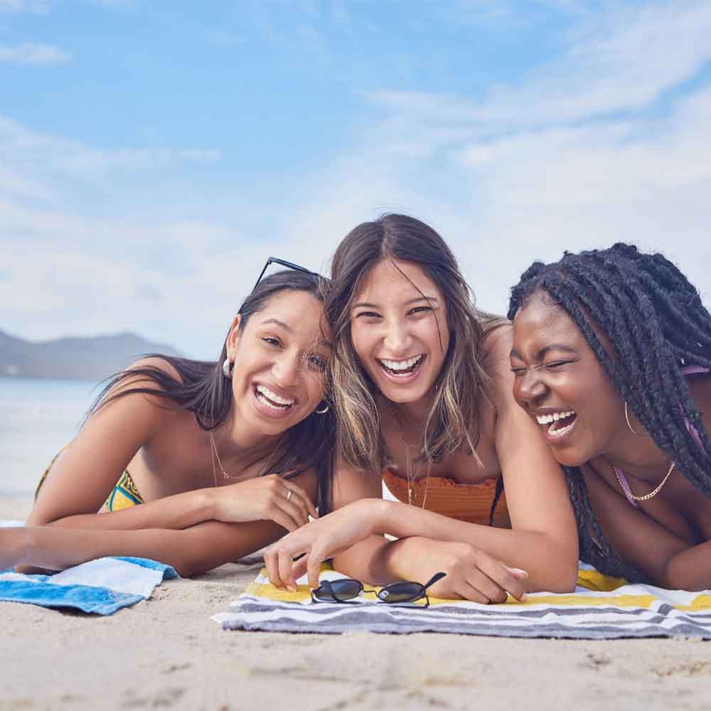 group of women enjoying their time on the beach